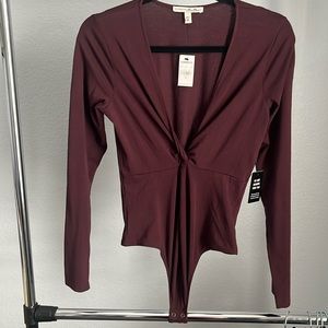 NWT Express Burgundy bodysuit with deep plunge